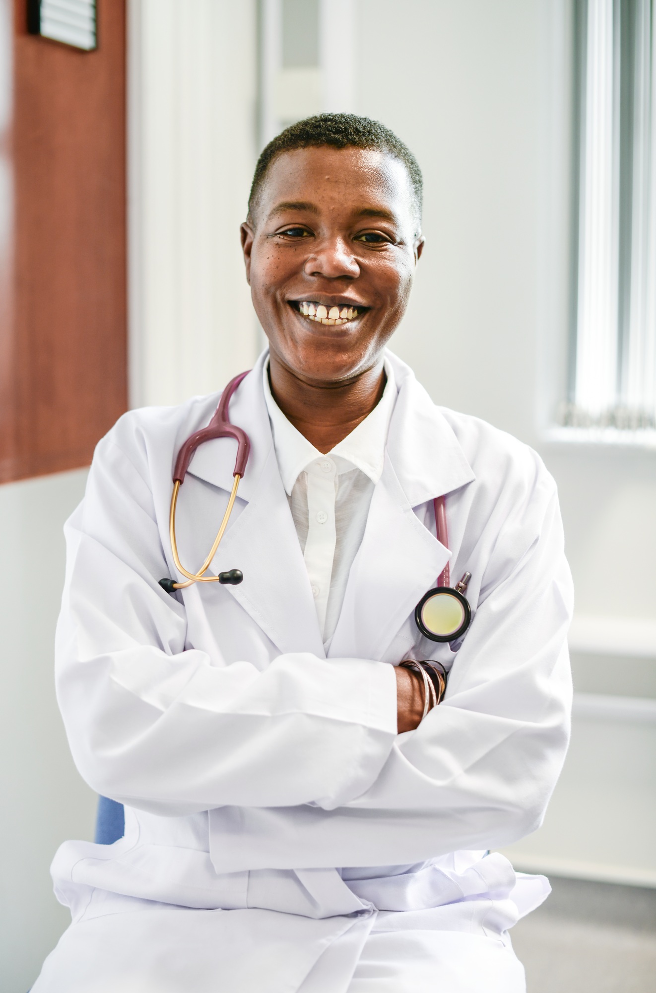 Happy doctor at a hospital